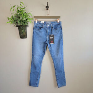 NEW Levi's 29 311 Shaping Skinny BIG E Mid Rise Tummy Slimming Medium Wash Jeans